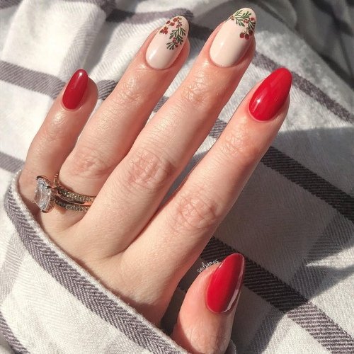Festive Red & Nude Nails with Holiday Floral Accents.