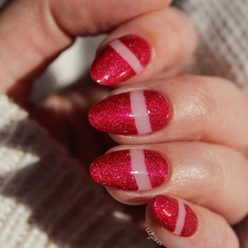 Glitter Red Nails with Bold Negative Space Stripes.