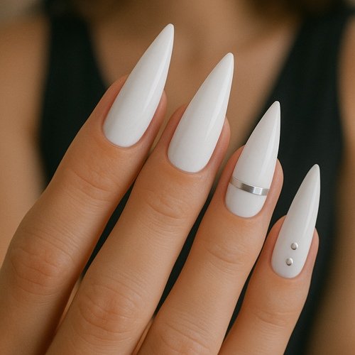 White Stiletto Nails with Silver Accents