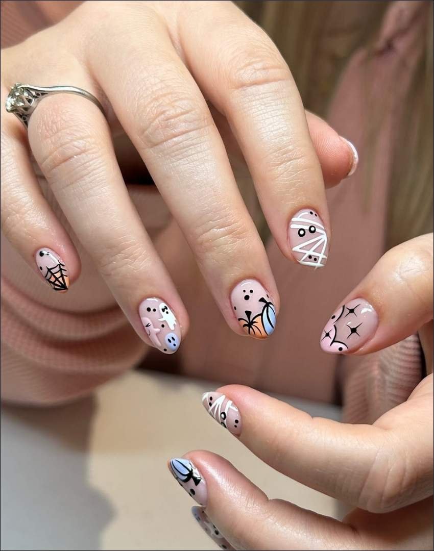 Minimalist Ghost and Spider Web Nails